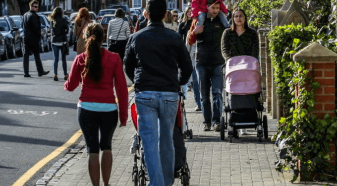 People walking down the road