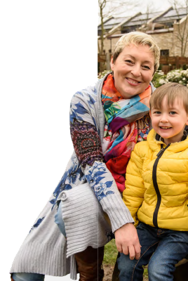 Woman and child smiling at the camera