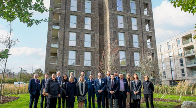 Group of people standing in front of a building