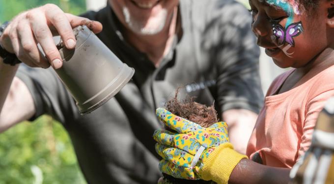 Man and child gardening